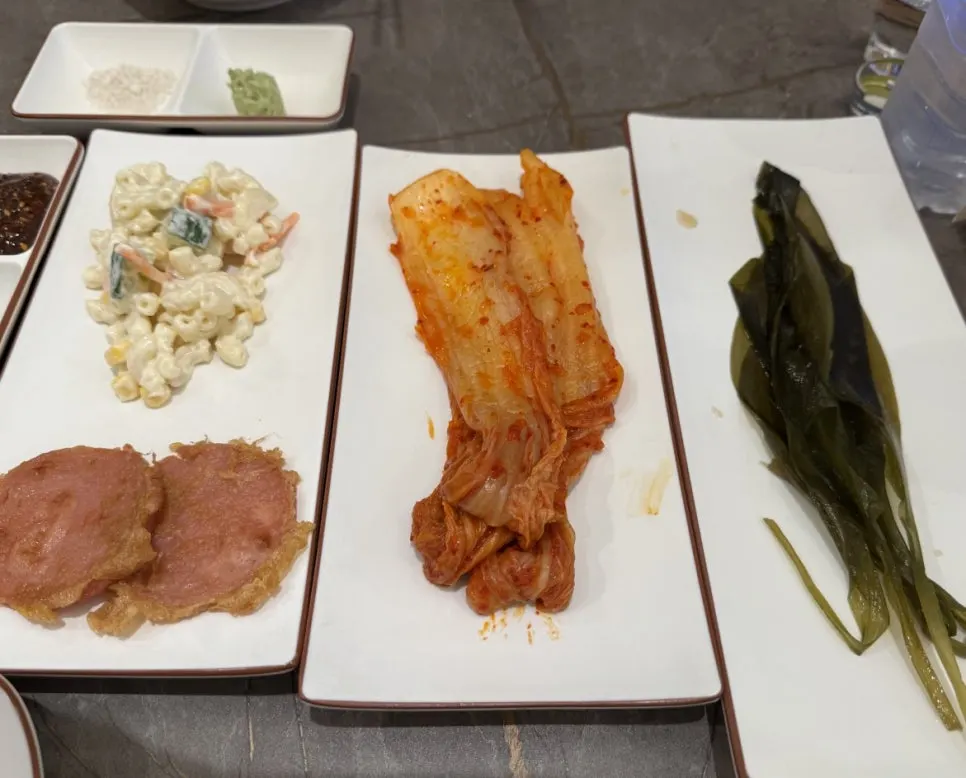Basic side dishes including macaroni salad and pink sausage