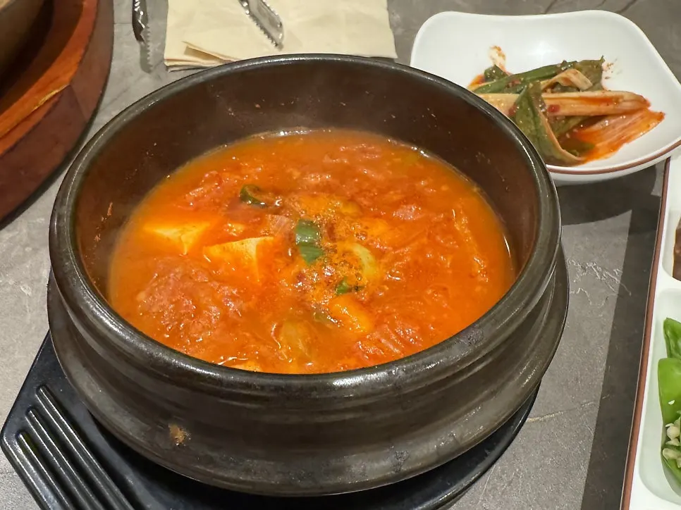 Free aged-kimchi stew served with the meal