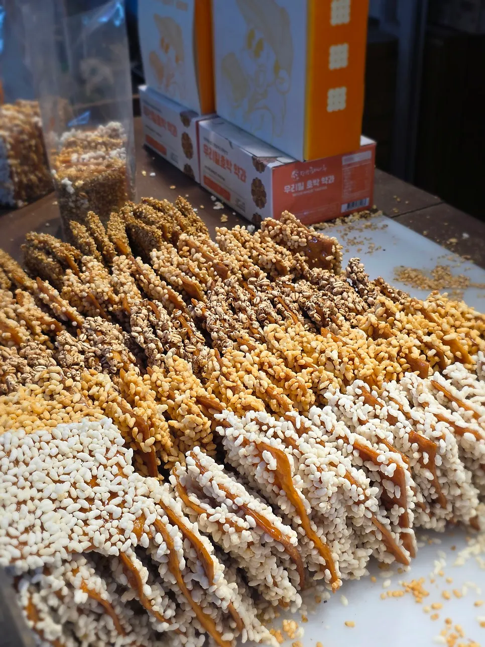Neatly stacked brown rice gwajul
