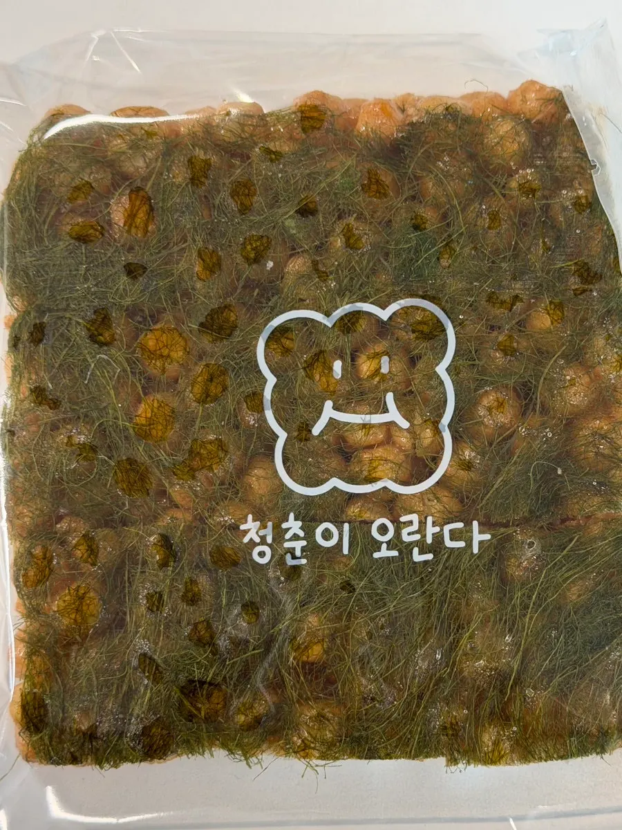 Bungkusan individu oranda dibuka