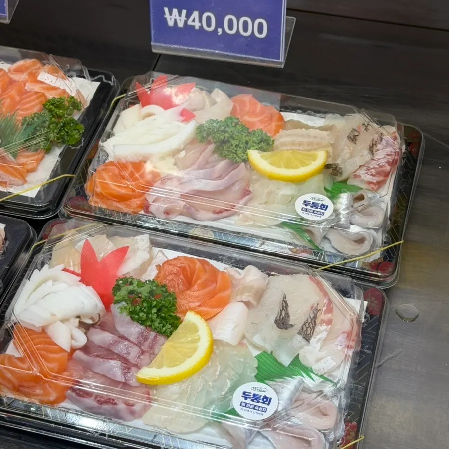 Close-up of glossy sashimi slices from the assorted platter