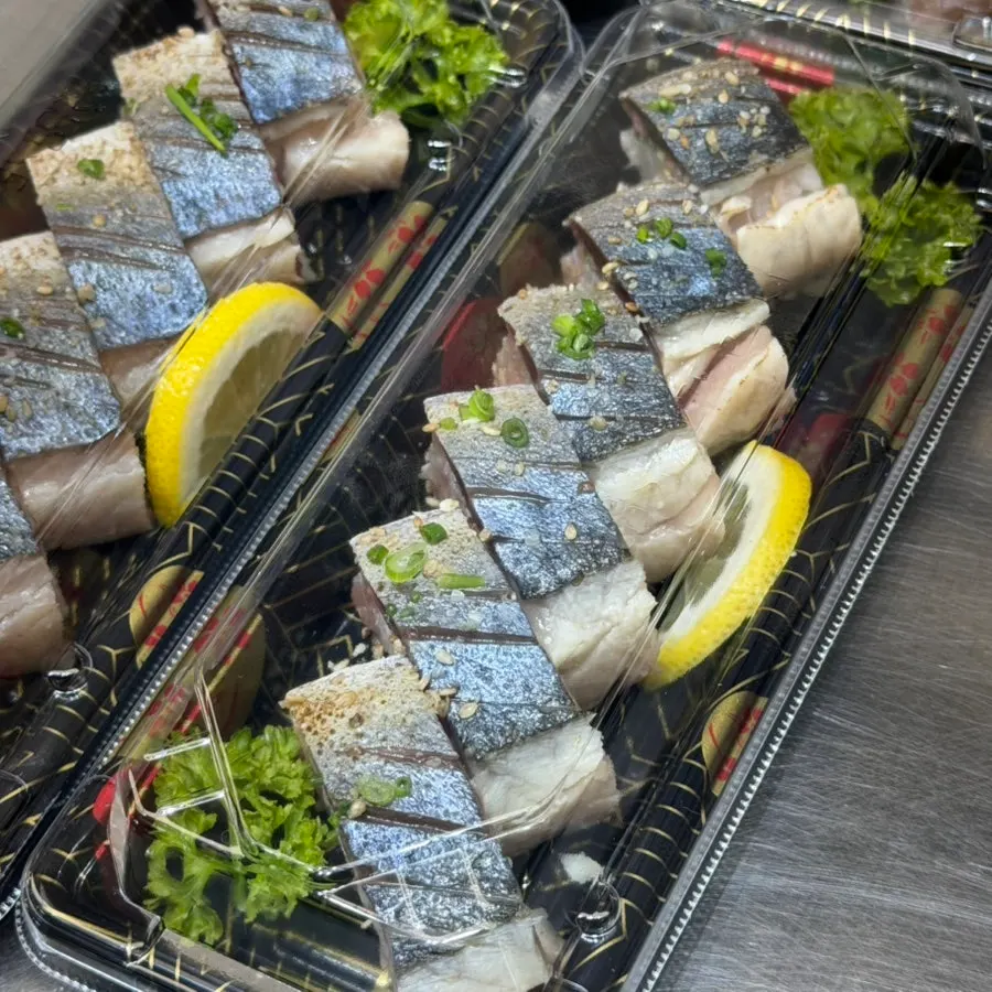 Sushi takeout containers on display at Dutumhoe