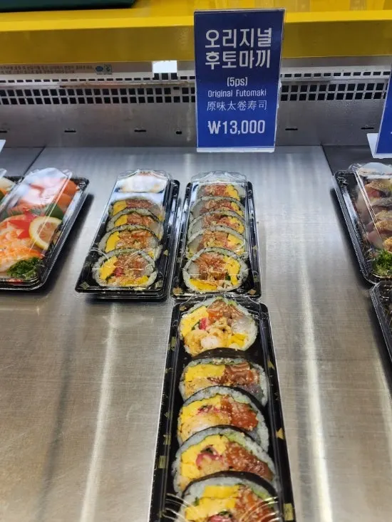 Sushi menu display case at Dutumhoe