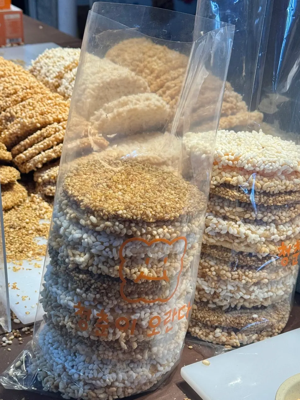Traditional Jeju gwajul coated in syrup and puffed rice