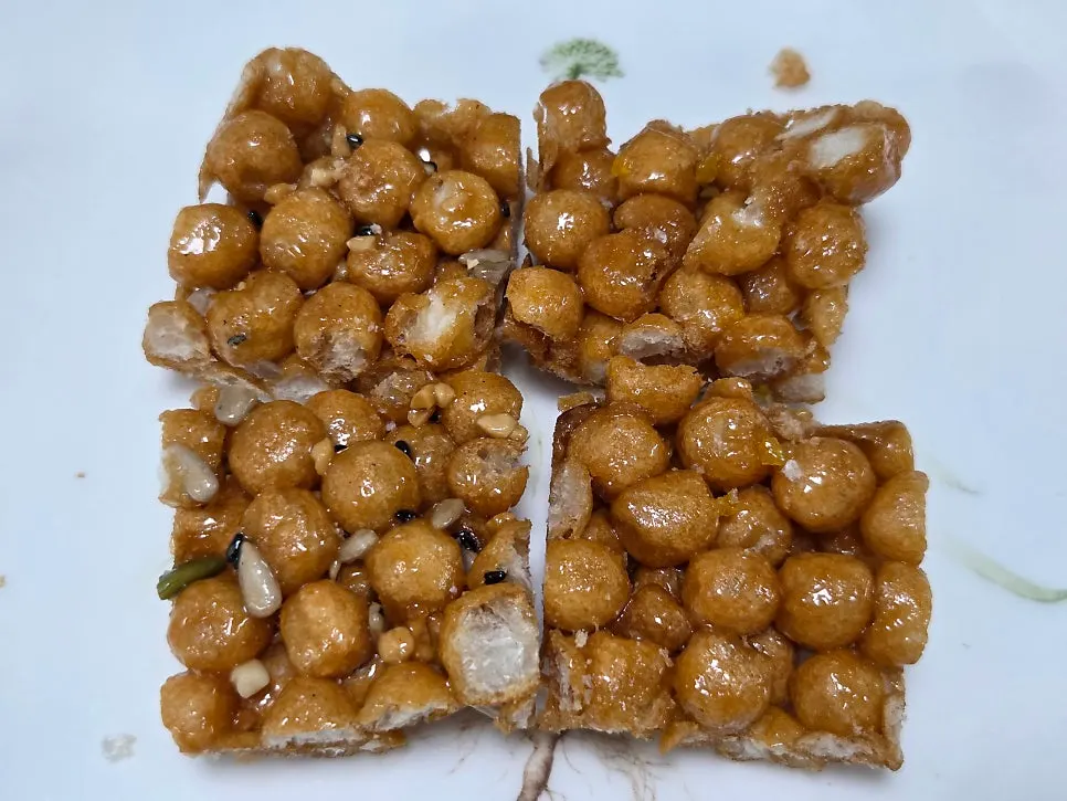 Pieces of square oranda broken apart on a plate