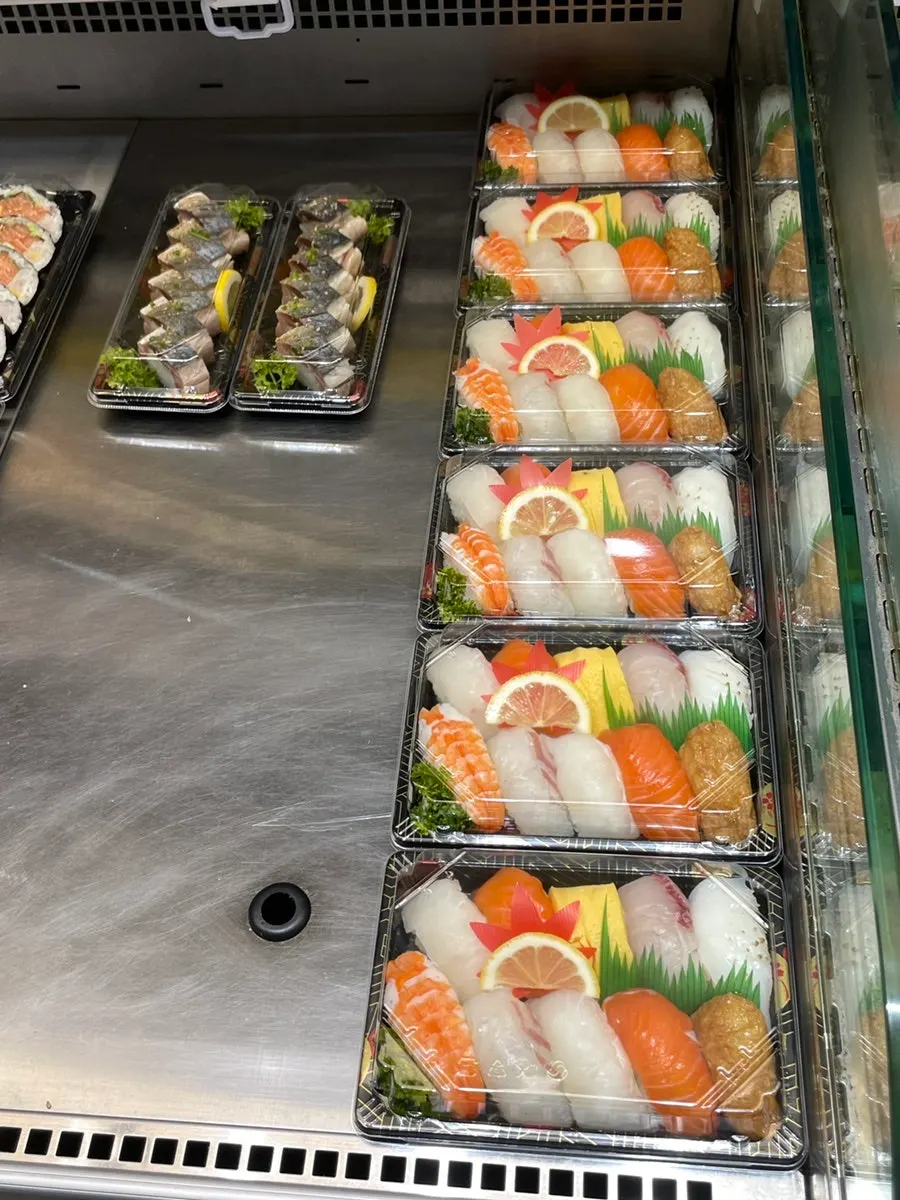 Mackerel pressed sushi on display