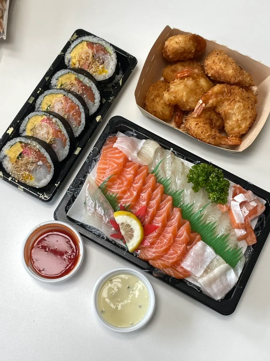 Sashimi takeaway spread laid out at home