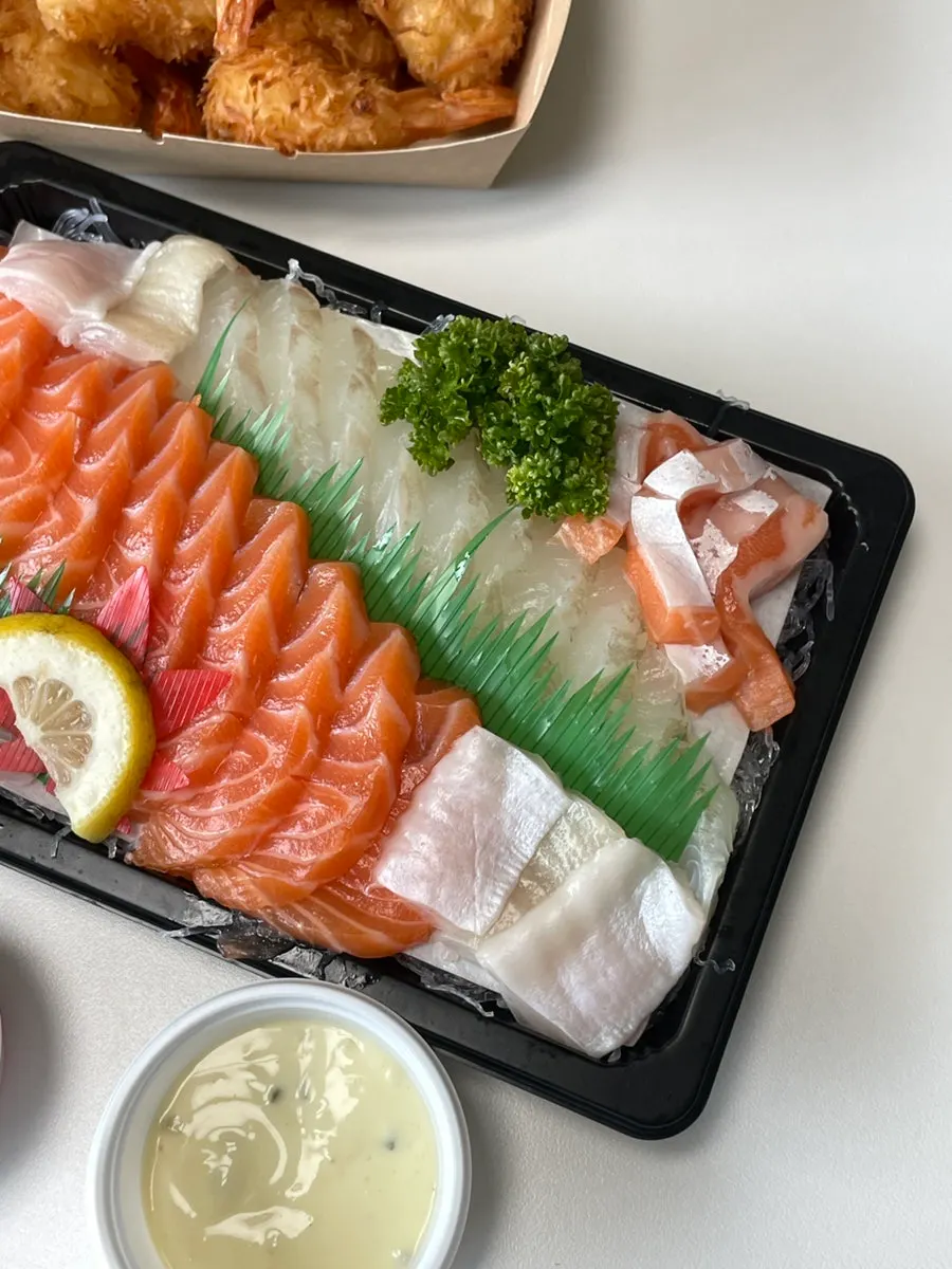 Thickly sliced salmon and flounder sashimi