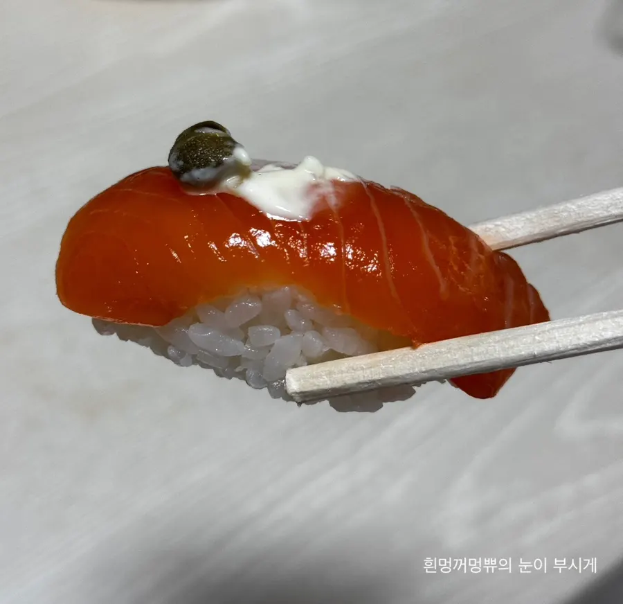 Special sushi with squid and salmon
