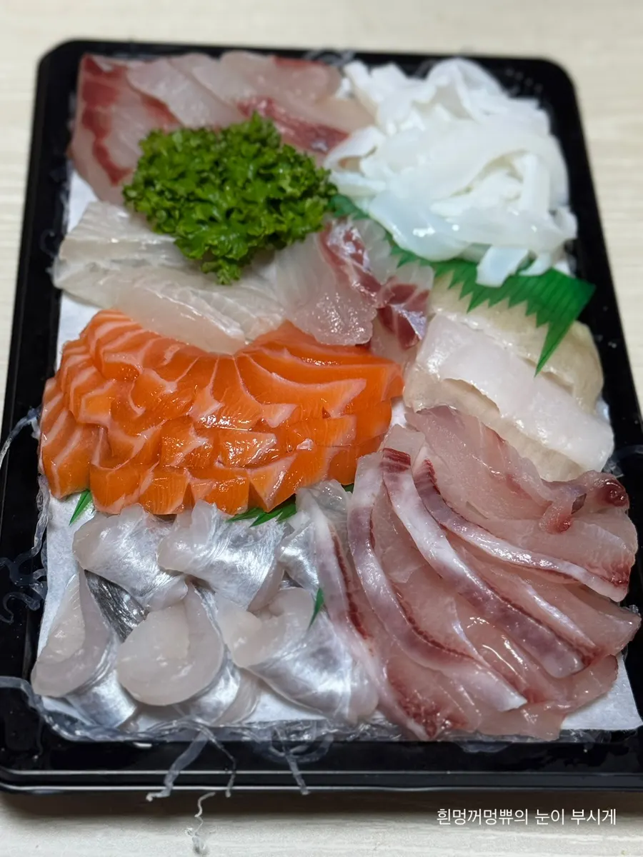 A plate of the Dutum Signature assorted sashimi