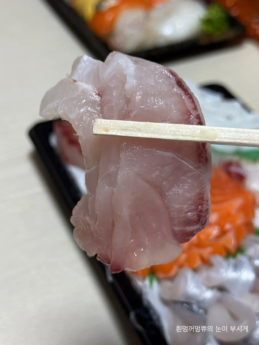 Close-up of fresh hairtail and seasonal sashimi