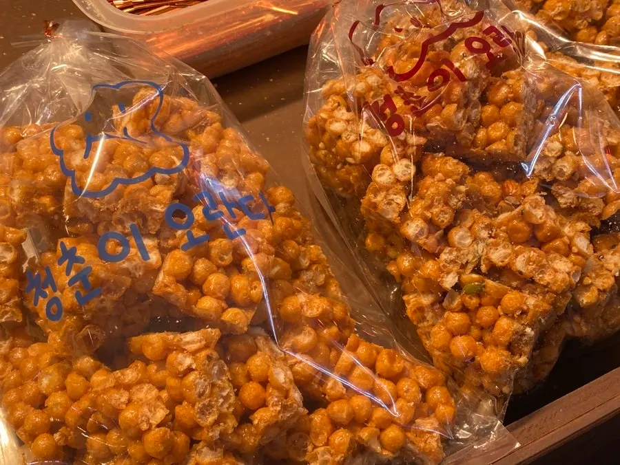Packaged gwajul products displayed in the store