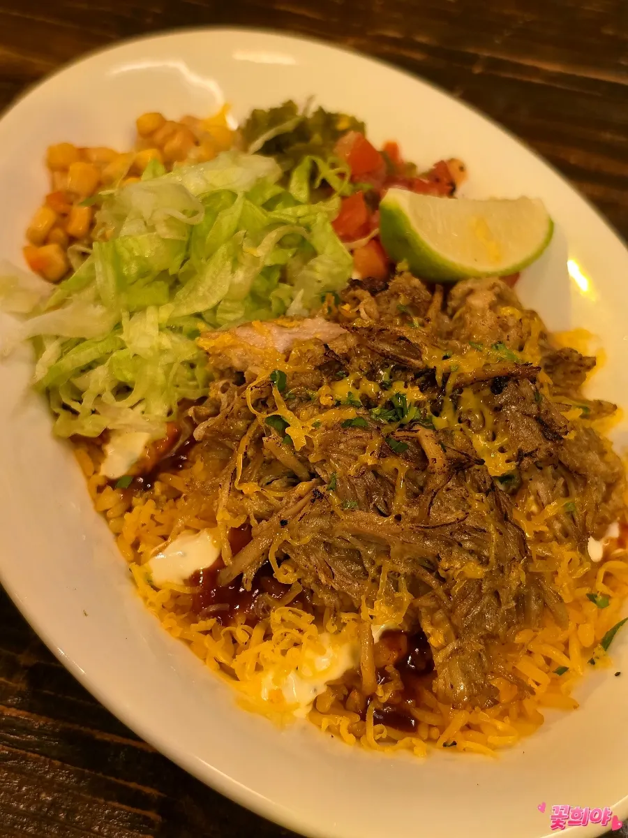 Braised pork bowl with toppings over rice