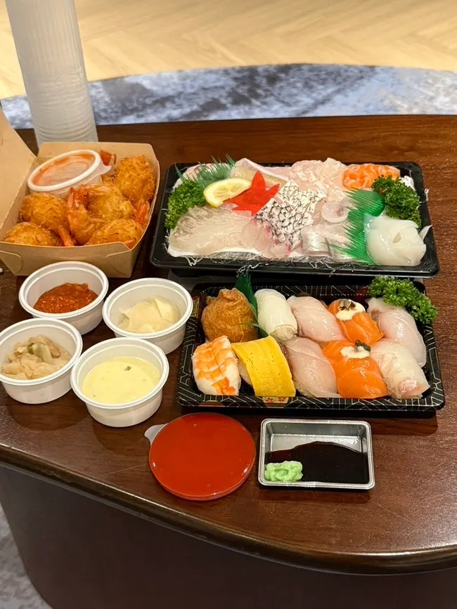 A full sashimi takeaway spread at the hotel