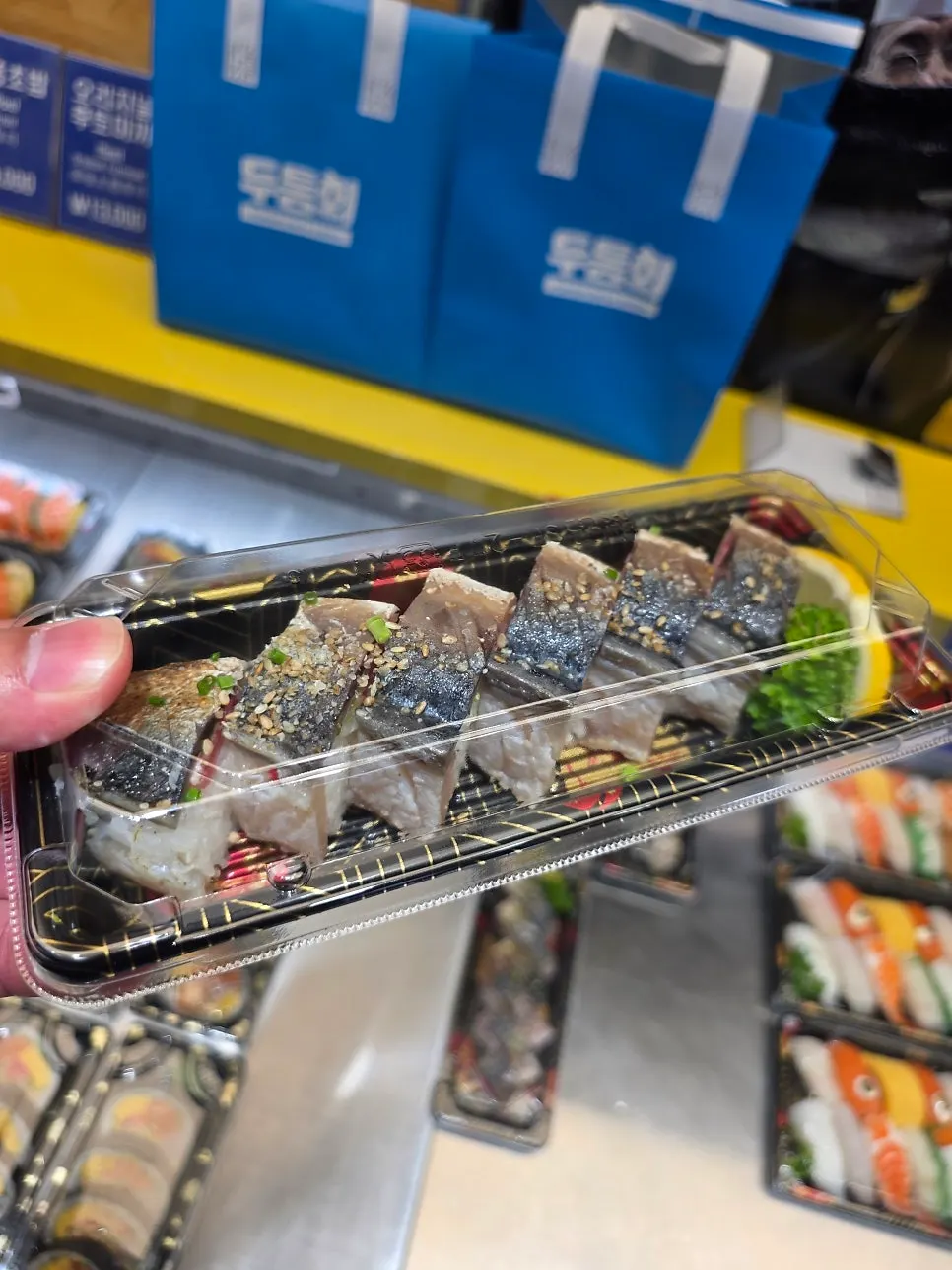 Takeaway order of mackerel pressed sushi
