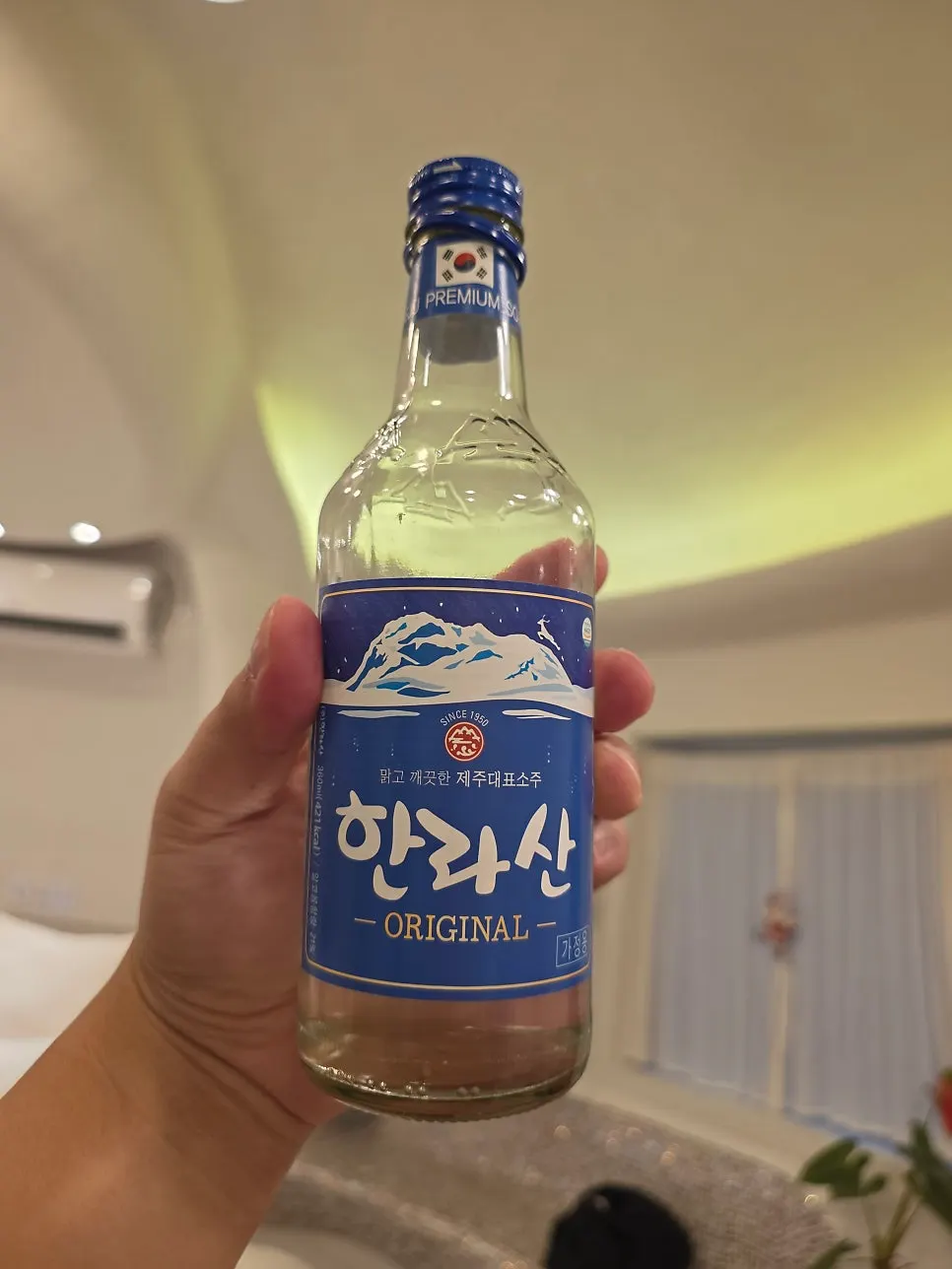Flounder sashimi with Hallasan soju