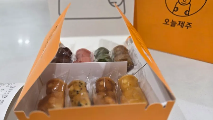 Dol hareubang-shaped dessert products on display