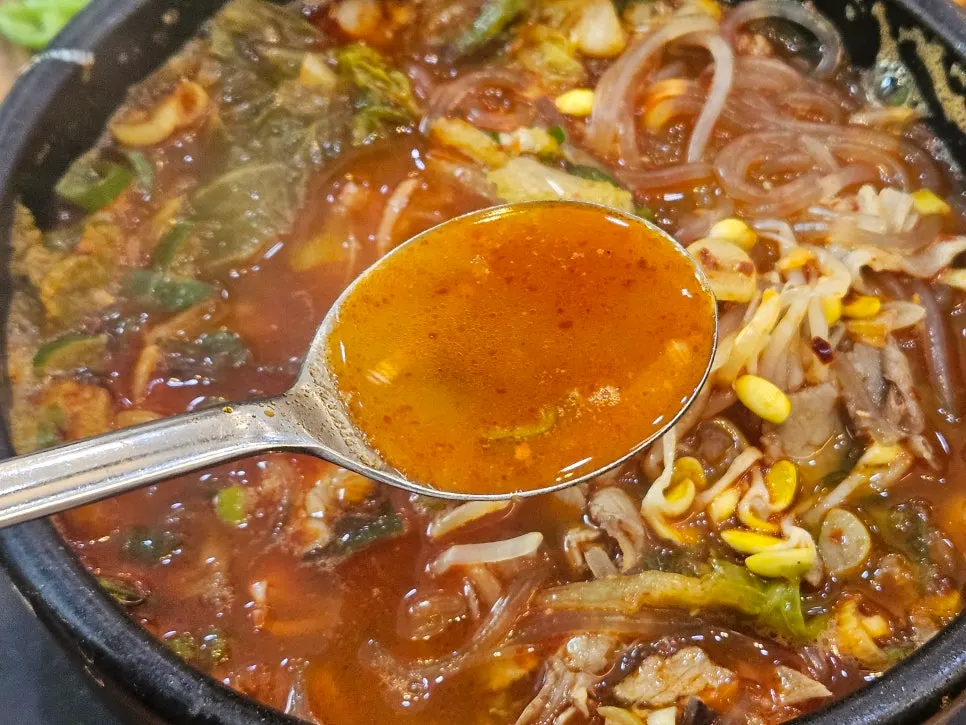 Jeju-style haejangguk with a sharp, spicy broth