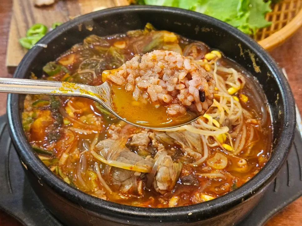 A bowl of haejangguk with rice mixed in