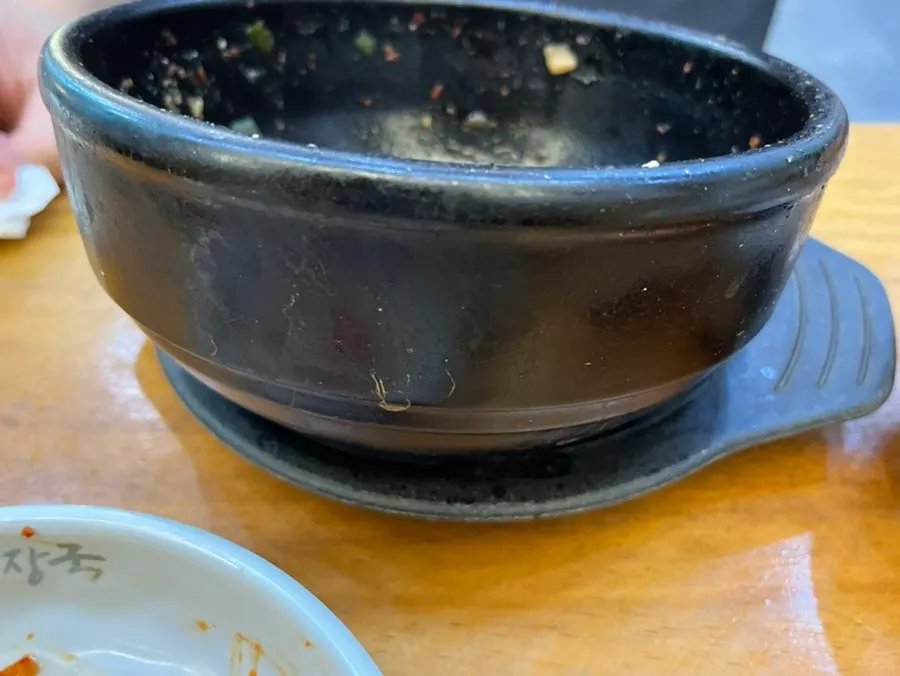 ご飯を混ぜてすくった解腸湯の一口