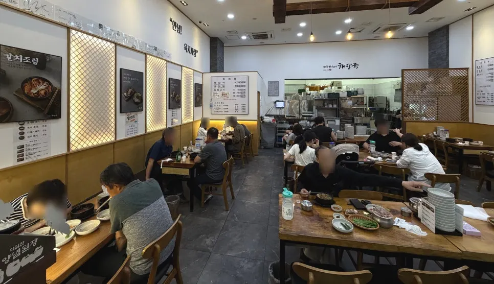Spacious restaurant interior decorated in wood tones
