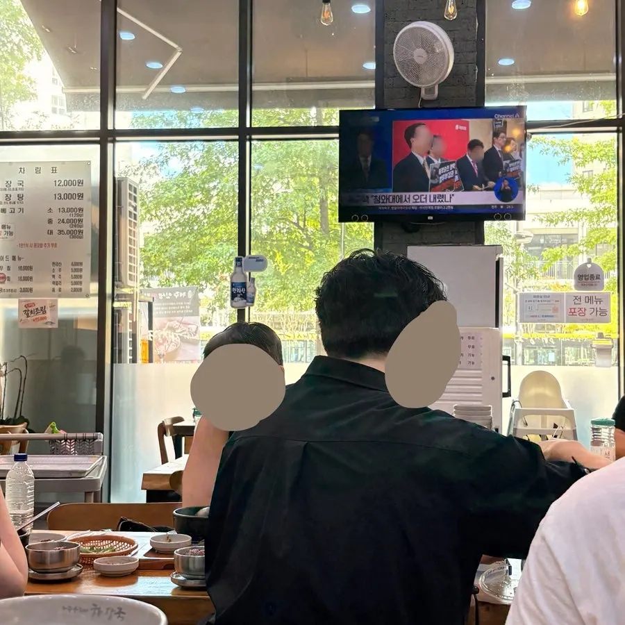 Restaurant interior with a Jeju Island map on the wall