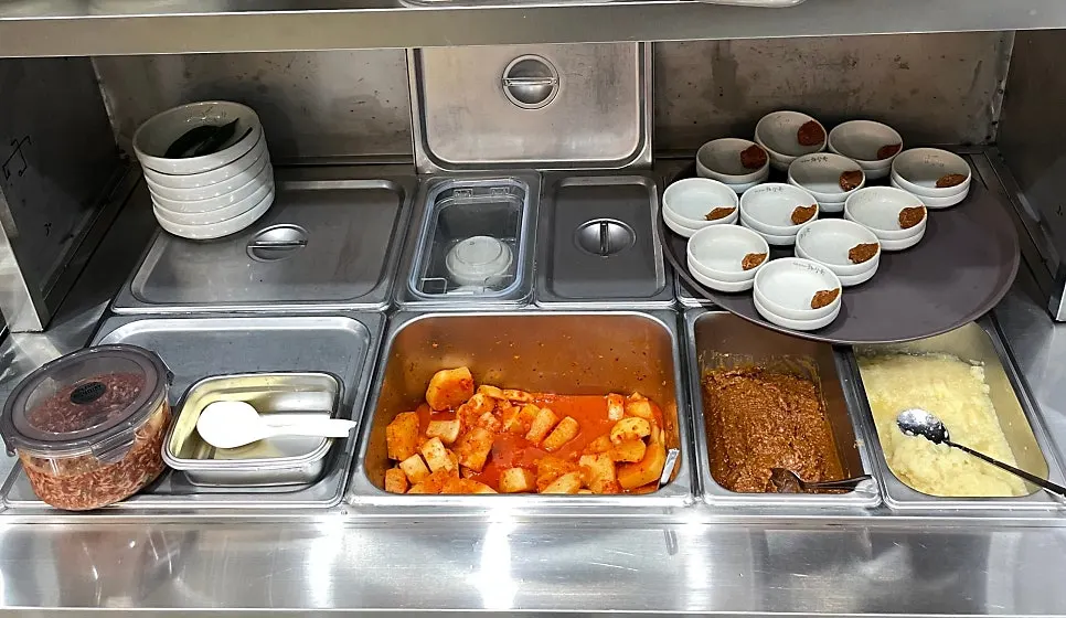 Side dishes laid out at the self-serve bar