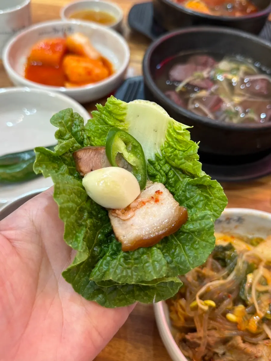 Plate of Jeju-sourced boiled dombe pork with the skin on