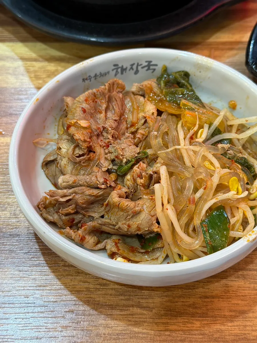 Haejangguk ingredients packed with meat, glass noodles, siraegi, and bean sprouts