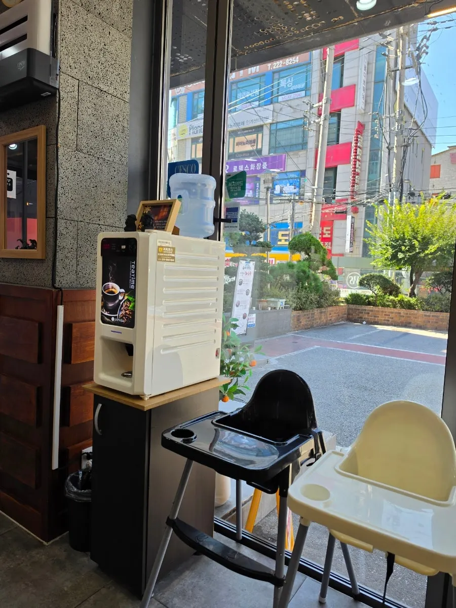 Bright, spacious interior with a map of Jeju on the wall