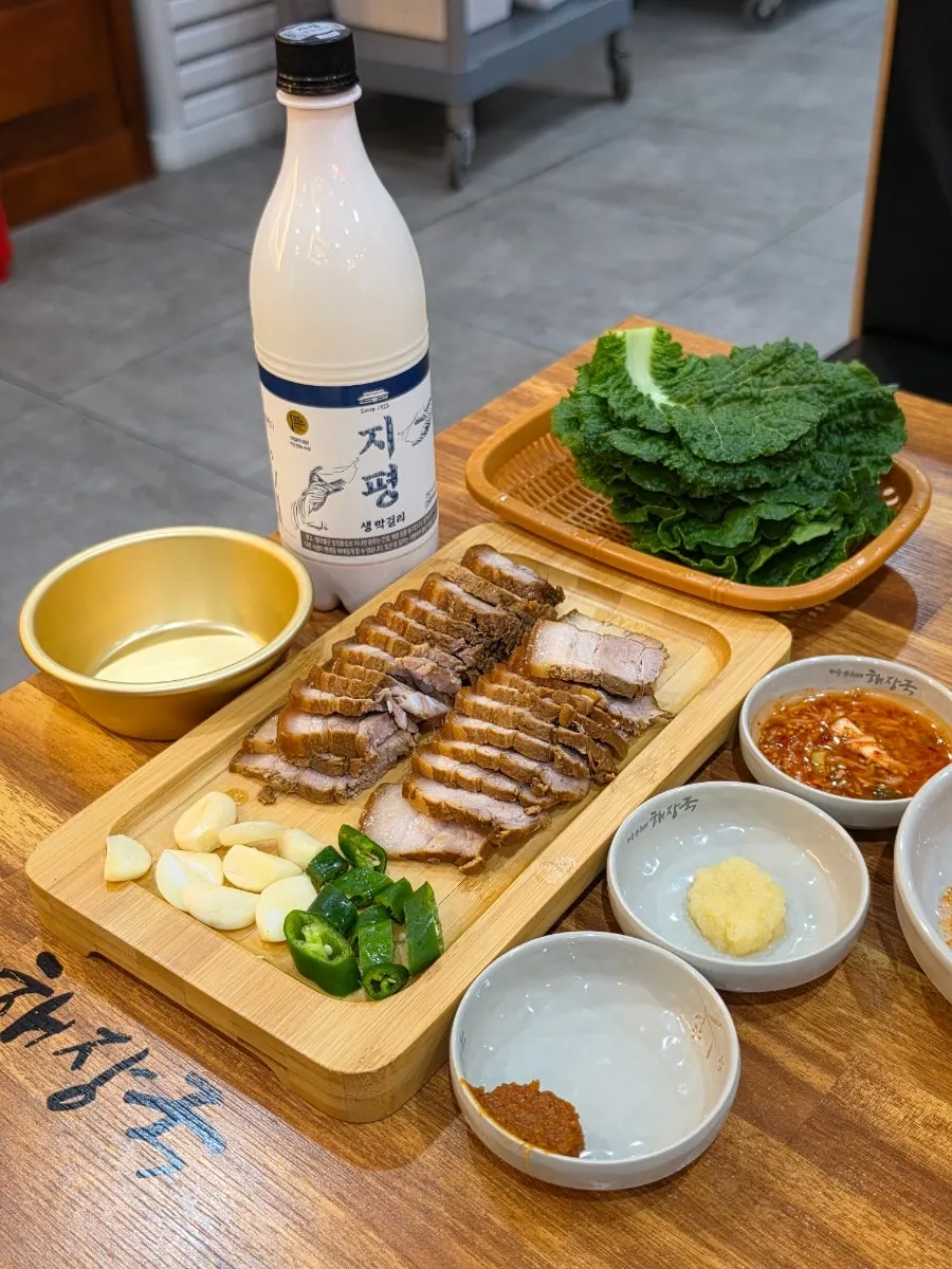 Jeju-style dombe pork sliced on a cutting board