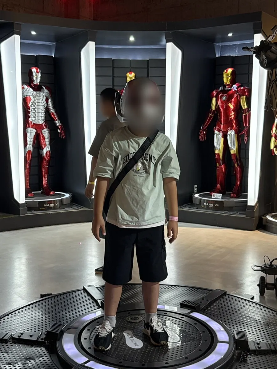 A child playing in the hands-on exhibit corner