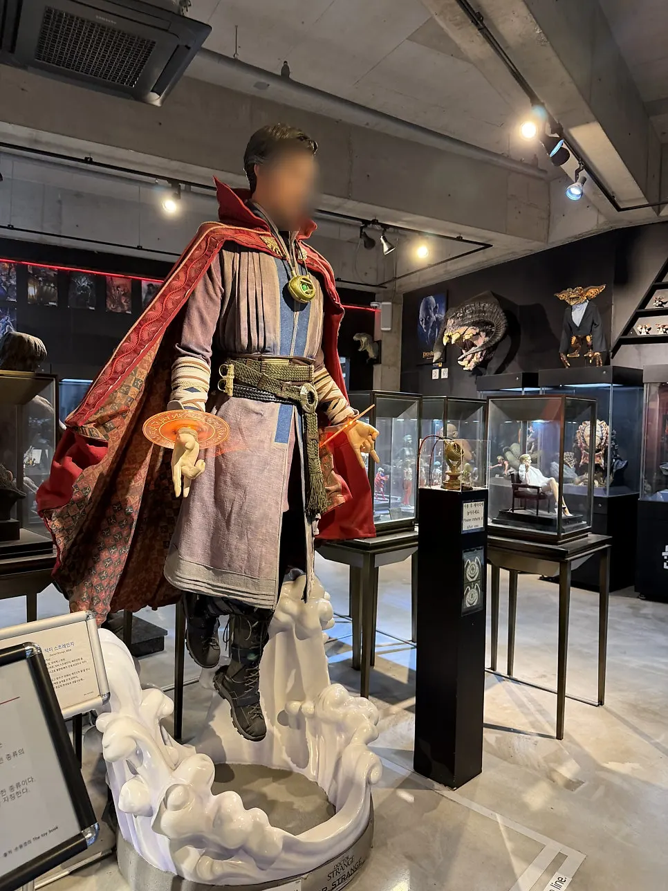 Various character figures displayed at the entrance