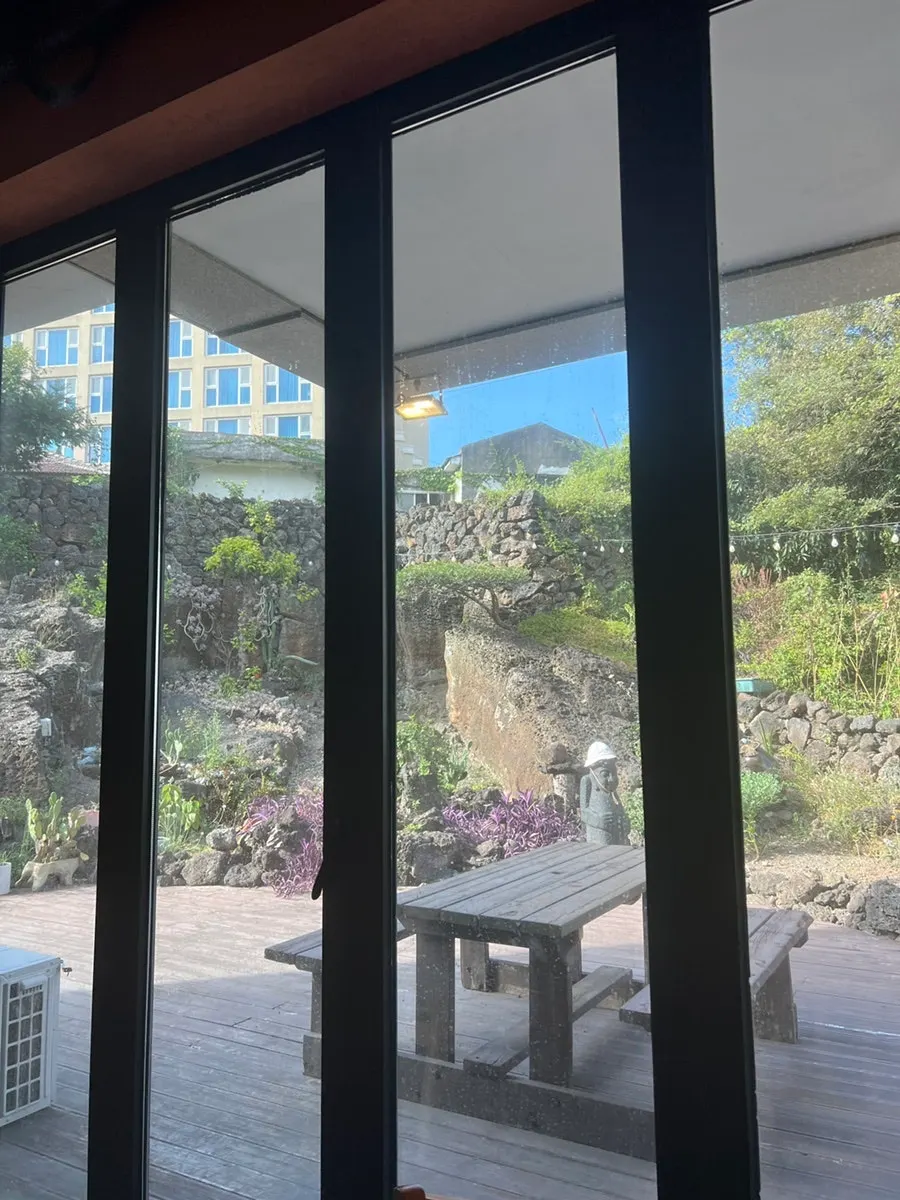 Seating with a view of the Jeju scenery outside the window