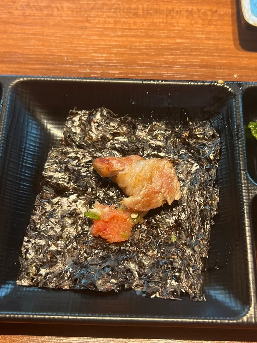 Grilled black pork dipped in sauce