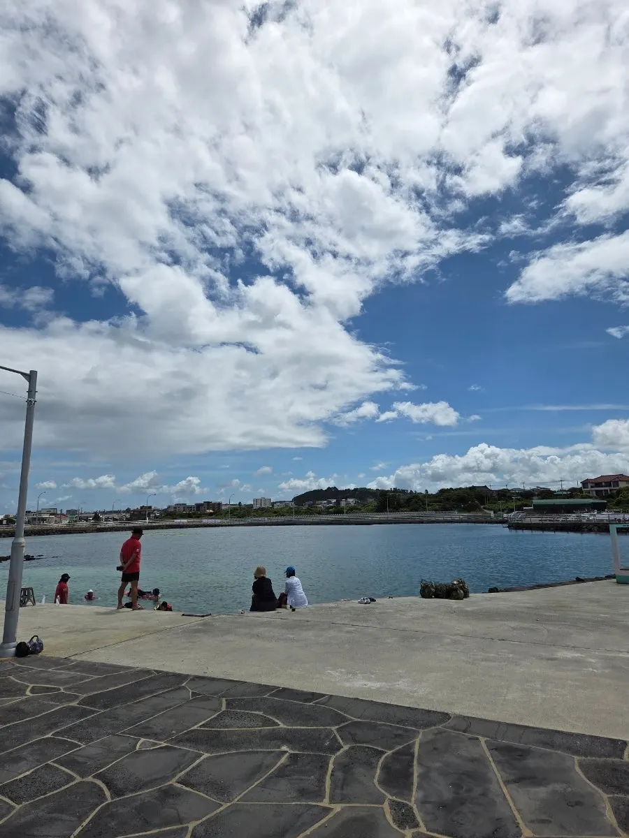 View of the sea walking experience site with the sea color and sky at Gimnyeong