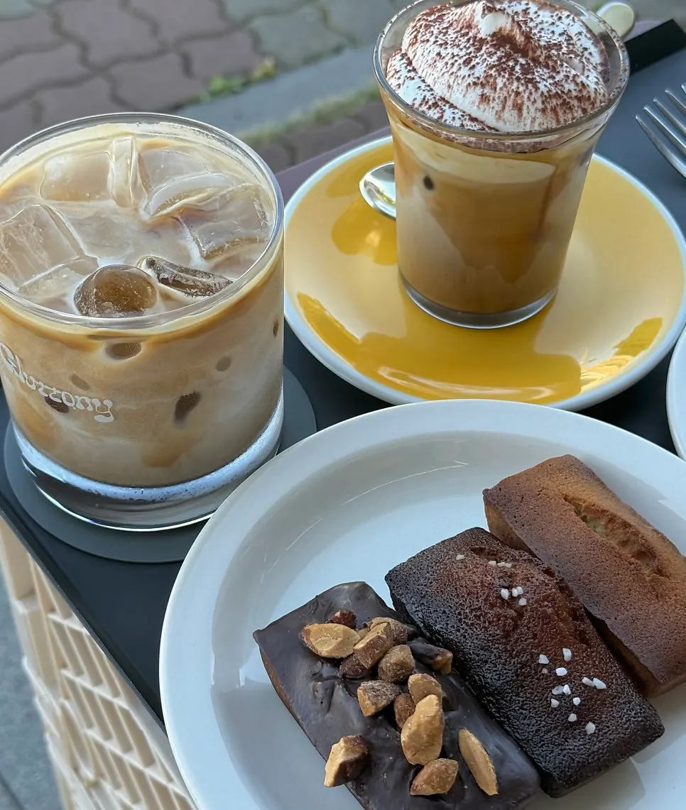 Rich chocolate cake enjoyed with a latte