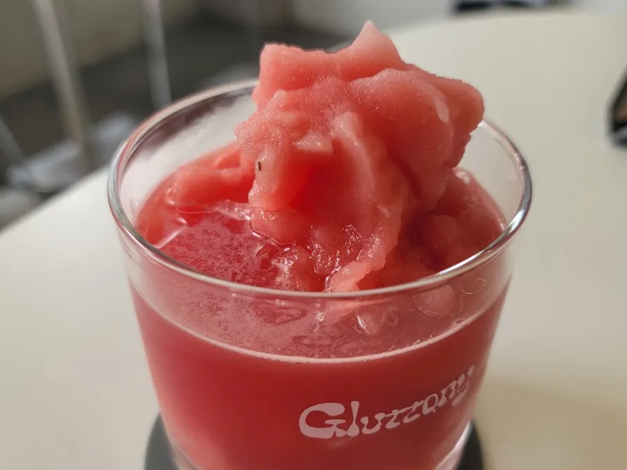 A glass of refreshing red watermelon ade