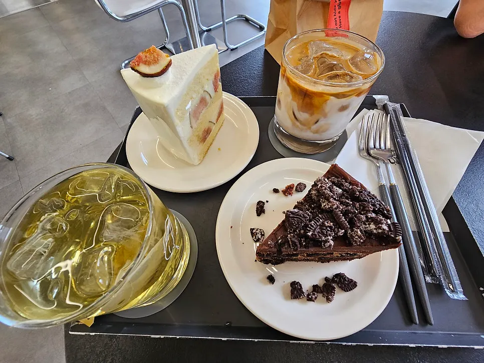 Levain cookies and financiers displayed at Gluttony Coffee