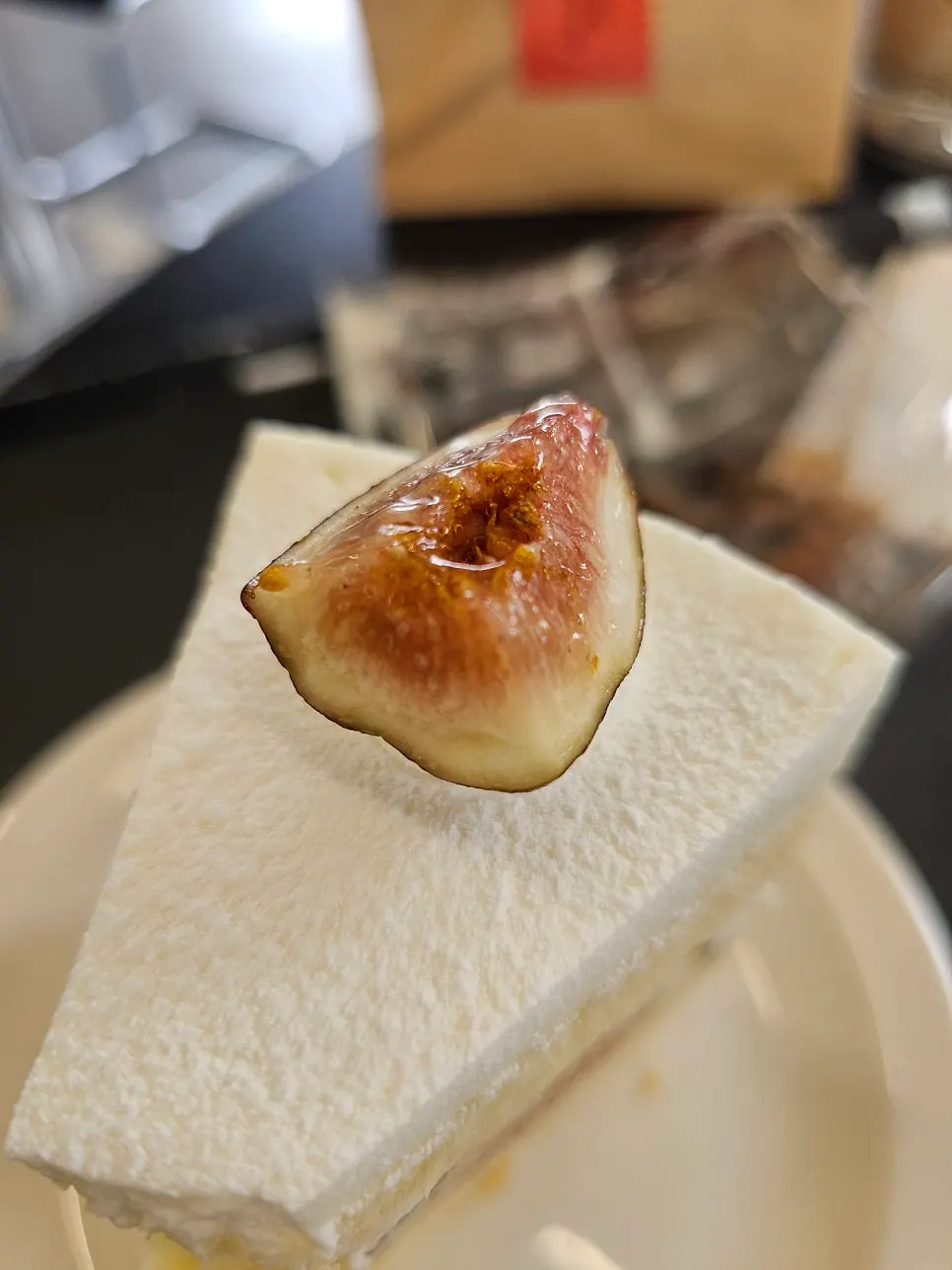 Whipped cream cake topped with large fig chunks