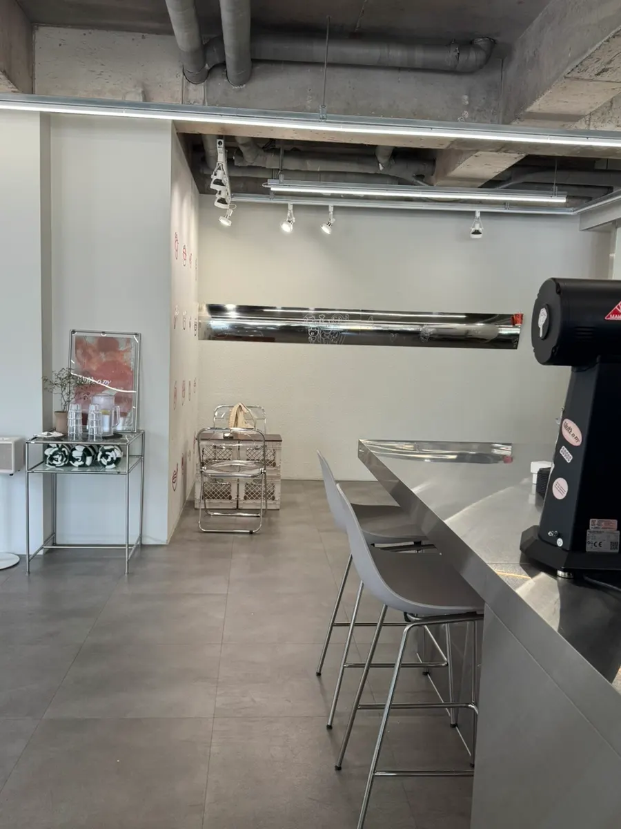 Interior seating and photo-spot vibe at Gluttony Coffee