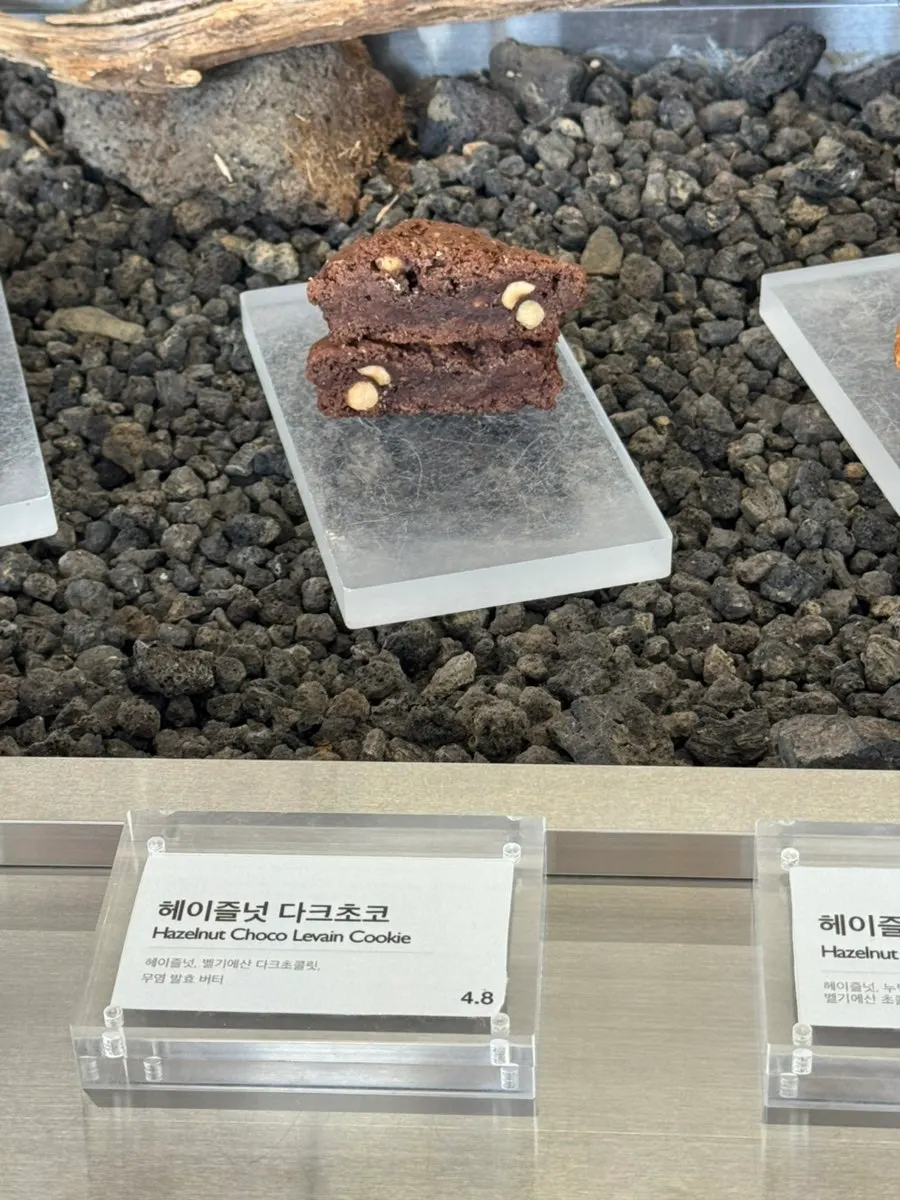 Close-up of the dessert display case at Gluttony Coffee