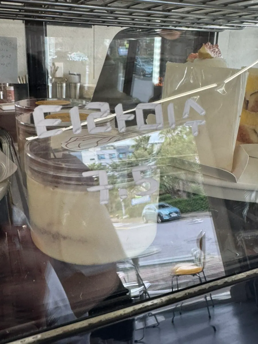 Sliced cakes on display at Gluttony Coffee