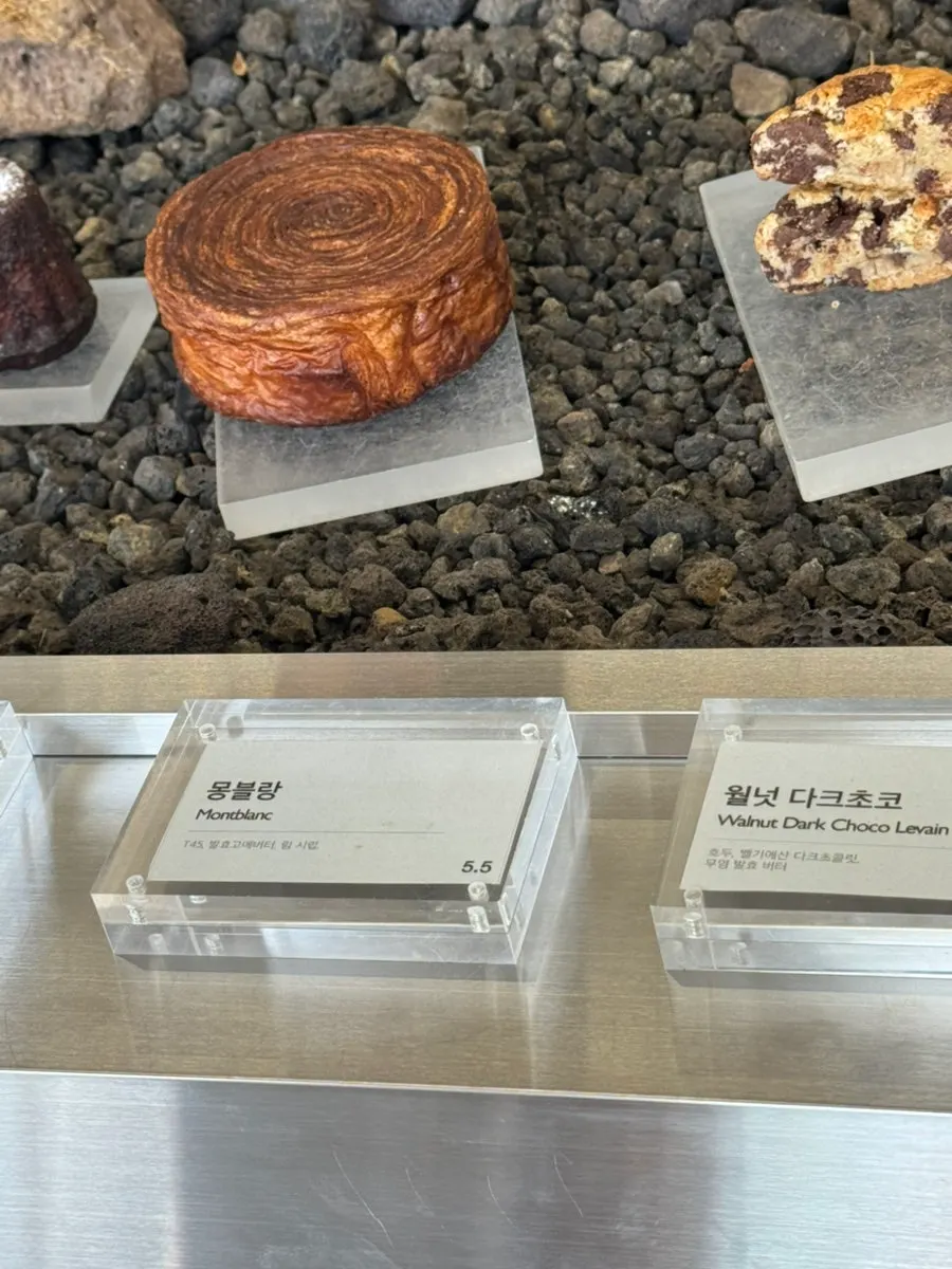 Assorted desserts on display at Gluttony Coffee