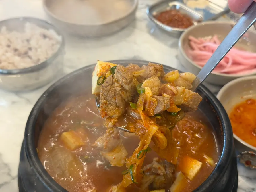 Black pork set served with a bowl of rice