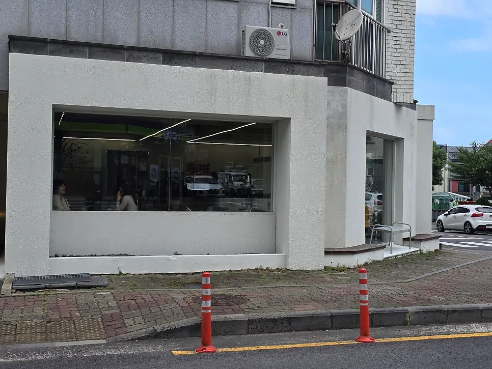 Exterior of the Gluttony Coffee building in Gudam-dong, Jeju City