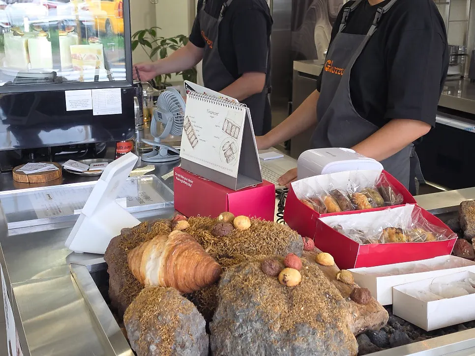 Levain cookies and financiers on display