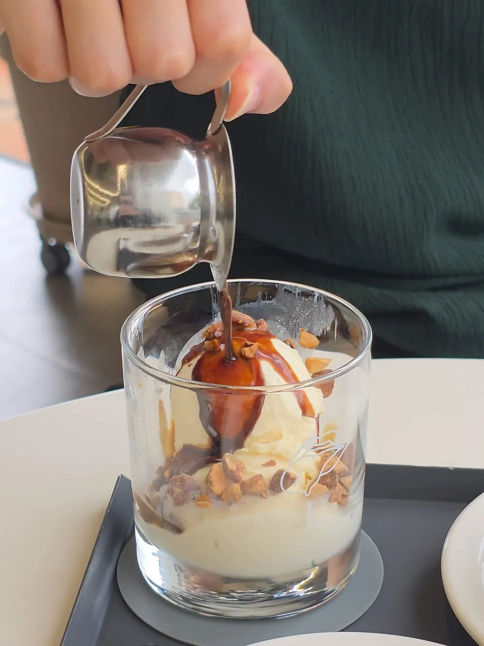 Table with the affogato and latte side by side