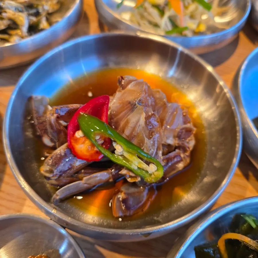 Tasting the full table of side dishes