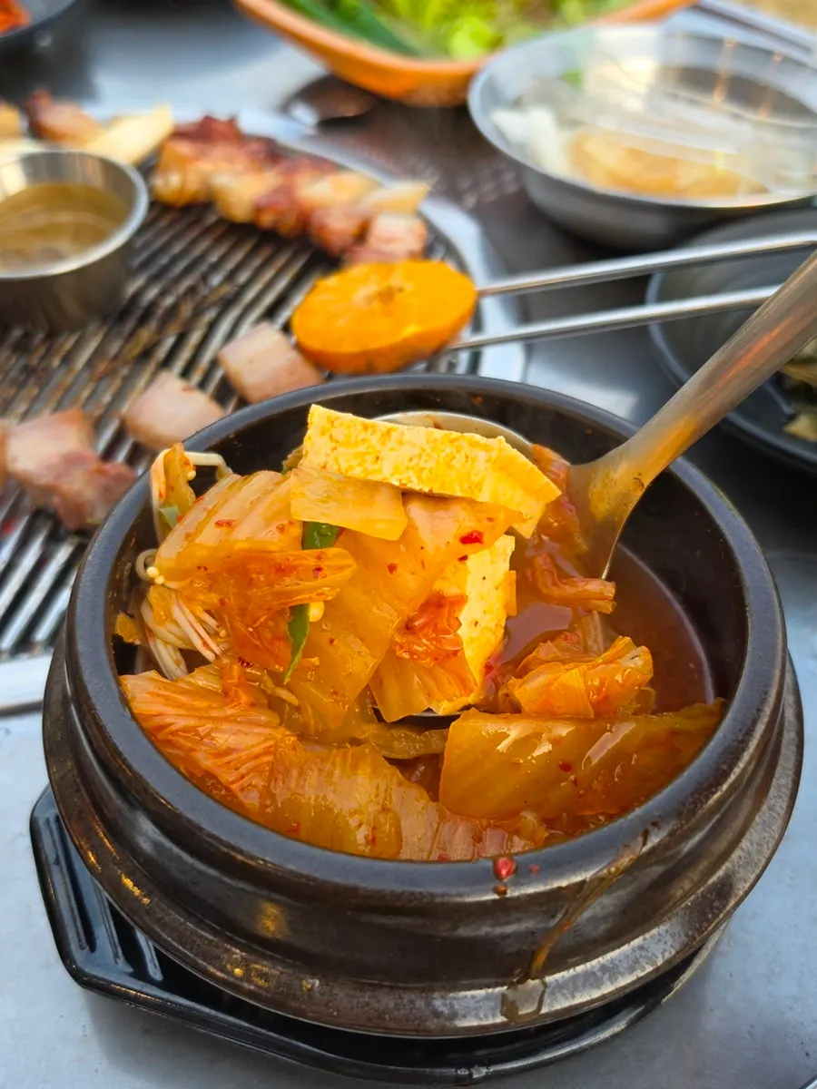 A grilled piece of black pork ogyeopsal